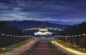 ANZAC Parade and Parliament House at night with clouds